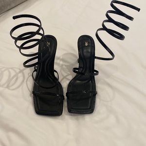 Beautiful never worn wrap around black heels